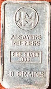 Front of Johnson Matthey and Mallory 50 grains silver bar, stamped Fine Silver 999